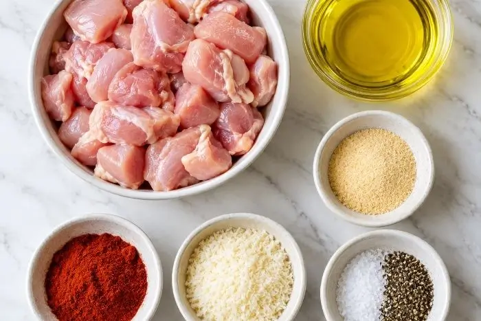 Chicken Bites 2 Raw ingredients for low-carb chicken bites recipe arranged in bowls